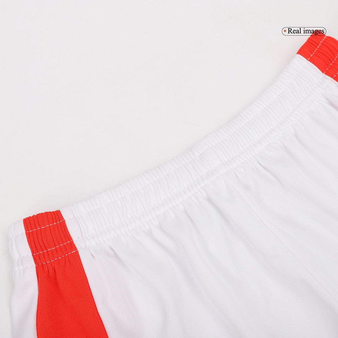 Kit de fútbol local del Manchester United para niños (Kit, pantalón corto y calcetines) 2024/25