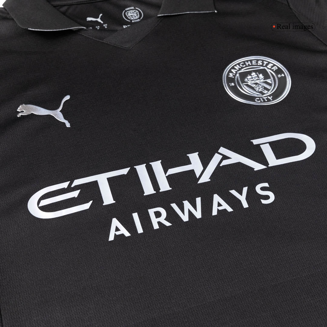 Kit de visitante del Manchester City (camiseta, pantalón corto y medias) 2025/26