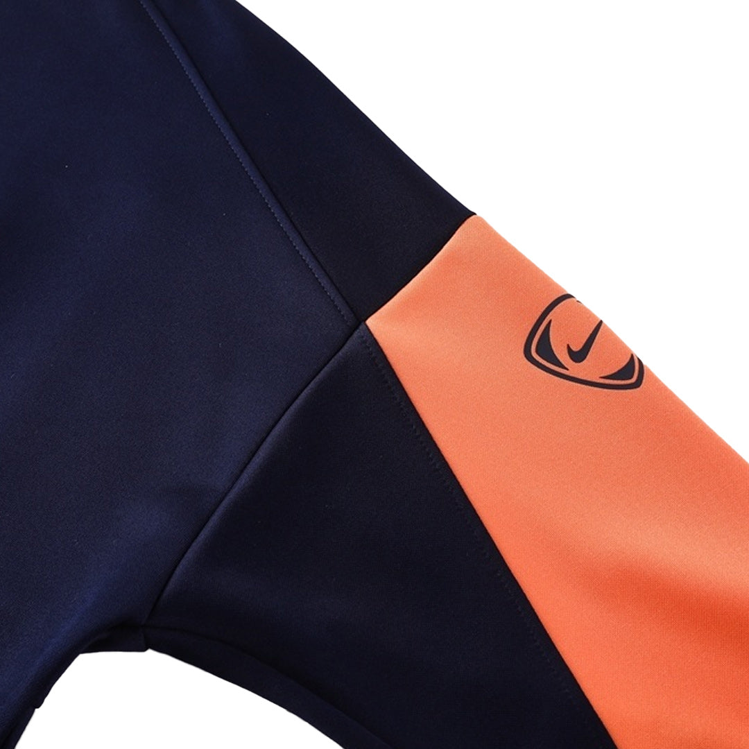 Chaqueta de entrenamiento del Barcelona 25/26 azul marino y naranja